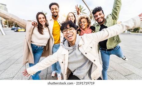 Happy Multiracial Friends Having Fun Walking On City Street - Group Of Young People Hanging Outside Together - Friendship Concept With Guys And Girls Enjoying Day Out 