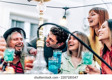 Happy Multiracial Group Of Friends Drinking Cocktail And Smoking Shisha At Hookah Bar - Smiling People Of Different Ages Make Party At At Beer Garden Pub In Happy Hour - Friendship Lifestyle Concept