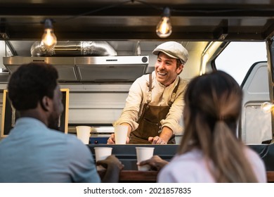 Happy multiracial people buying meal from street food truck market - Modern business and take away concept  - Powered by Shutterstock