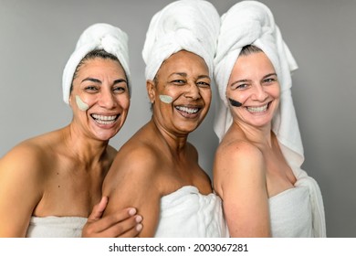 Happy Multiracial Senior Women Having Skin Care Spa Day - People Wellness Lifestyle Concept 