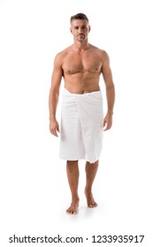 Happy Muscular Shirtless Man Wrapped In Towel Posing Isolated On White