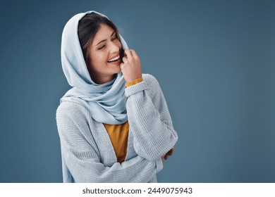 Happy, muslim woman and scarf in portrait for love of faith or religion isolated in studio. Islamic, female model and fashion with hijab, smile and casual style with mockup or promotional space - Powered by Shutterstock