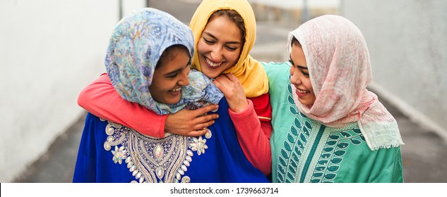 Happy Muslim Women Walking In The City Center - Arabian Young Girls Having Fun Spending Time And Laughing Together Outdoor - Concept Of Lifestyle People Culture And Religion