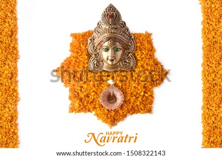 Happy Navratri, Durga Pooja, Marigold Flower Petals Decoration, Maa Durga face in Metal