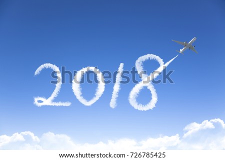 happy New year 2018 concept.drawing by airplane in sky
