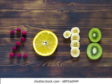 Happy New Year 2018 Of Fruit And Berries On Wooden Background