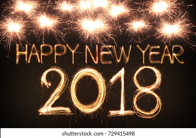 Happy new year 2018 written with Sparkle firework - Shutterstock ID 729415498