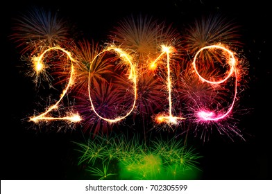 HAPPY NEW YEAR 2019 from colorful sparkle on black background Fireworks light up the sky,New Year celebration fireworks