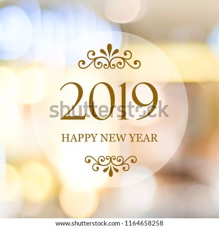 Happy New Year 2019 on blur abstract bokeh background, new year greeting card, banner