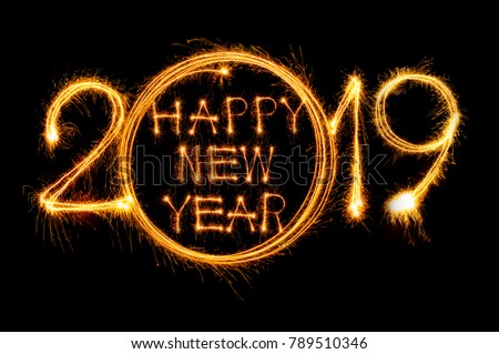 Happy new year 2019 text written with Sparkle fireworks isolated on black background