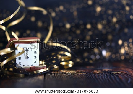 Happy New Year 2020. New year clock on wooden background