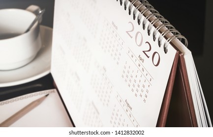 Happy new year 2020 concept: Close up calendar on desktop