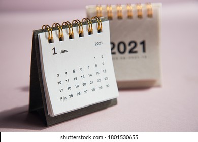 Happy new year 2021. Close up calendar on a pink desktop - Shutterstock ID 1801530655