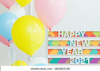 Happy New Year 2021 Greeting - Colored Balloons In The Background