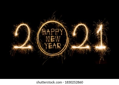 Happy New Year 2021. Sparkling burning text Happy New Year 2021 isolated on black background.  - Shutterstock ID 1830252860