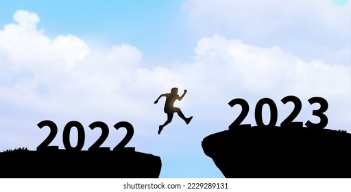 Happy new year 2023. Man silhouette jumping cliff from 2022 to 2023. start, goal, challenge.  - Shutterstock ID 2229289131