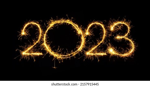 Happy New Year 2023. Number 2023 of sparkling sparklers isolated on black background With Copy Space For Text. Design element. Beautiful Glowing overlay template for holiday greeting card, Web banner