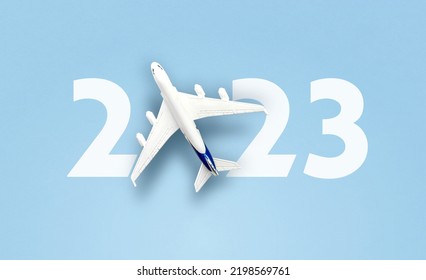 happy new year 2023. year 2023 with toy airplane - Shutterstock ID 2198569761