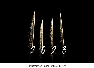Happy new year 2023 yellow fireworks rockets new years eve. Luxury firework event sky show turn of the year celebration. Holidays season party time. Premium entertainment nightlife background