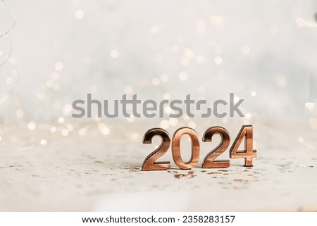 happy new year 2024 background new year holidays card with bright lights,gifts and bottle of hampagne Imagine de stoc © 