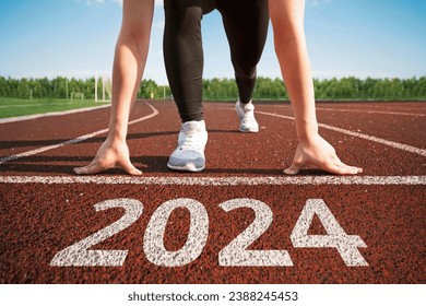 happy new year 2024. concept of starting a business or career in the new year. woman preparing for running. beginning of the 2024 year. transition to a new level concept. hope and expectation in 2024