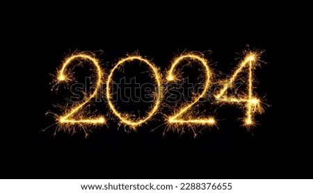 Happy New Year 2024. Sparkling burning numbers Year 2024 isolated on black background. Beautiful Glowing golden overlay element for design holiday greeting card, billboard and Web banner