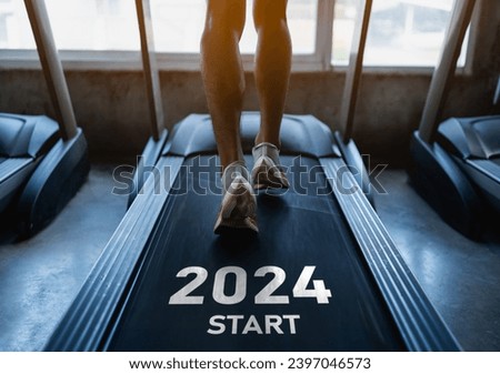 Happy new year 2024,2024 symbolizes the start of the new year. Close up of feet, sportsman runner running on treadmill in fitness club. Cardio workout. Healthy lifestyle, guy training in gym.