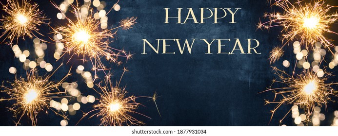 HAPPY NEW YEAR background - Firework, sparklers and bokeh lights on dark blue night sky - Shutterstock ID 1877931034