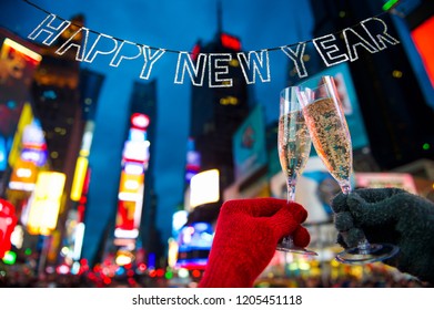 Happy New Year Champagne Toast Couple In Times Square New York City