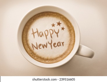 Happy New Year Drawing On Latte Coffee Cup