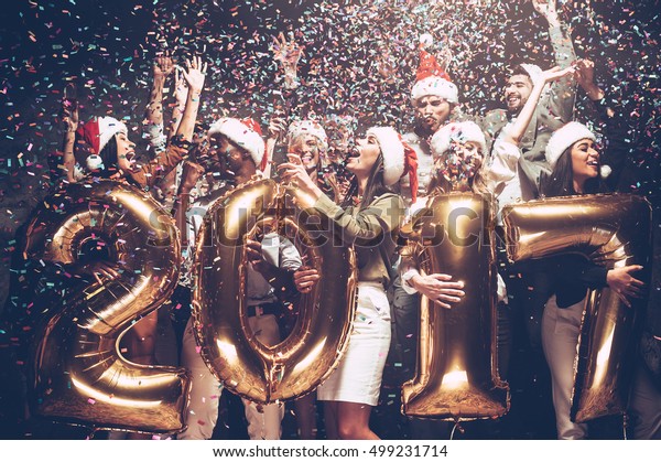 happy-new-year-group-cheerful-young-stock-photo-edit-now-499231714