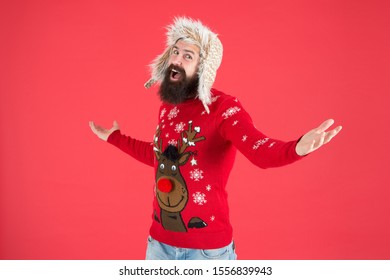 Happy New Year. Join Holiday Party Craze And Host Ugly Christmas Sweater Party. Winter Party Outfit. Invitation Ugly Sweaters Party. Sweater With Deer. Hipster Bearded Man Wear Winter Sweater And Hat.