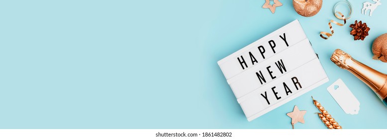 Happy New Year Text Light Box. Panorama Banner. Goodbye 2020 Concept Wide Angle Image On Blue Background. Abstract Celebration Concept With Copy Space For Message.