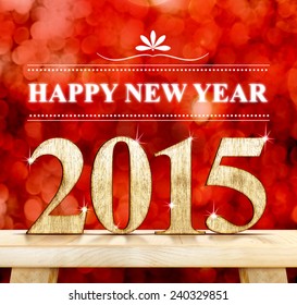 "Happy New Year " word and 2015 wood number on modern wooden table with sparkling bokeh wall,Holiday concept - Powered by Shutterstock