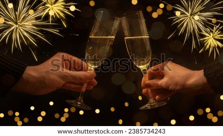 Happy new Year, New Year's Eve, Sylvester greeting card background - woman und man holding glass in the hand, clinking glasses, turn of the year, golden firework and bokeh lights on night sky