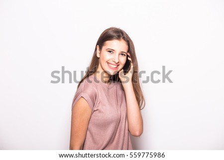 Happy nice girl speak on phone on white background