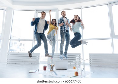 Happy Nice People Making A Jump