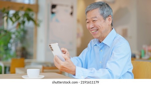 Happy Old Asian Man Working In Coffee Shop Have Achieved Good Results