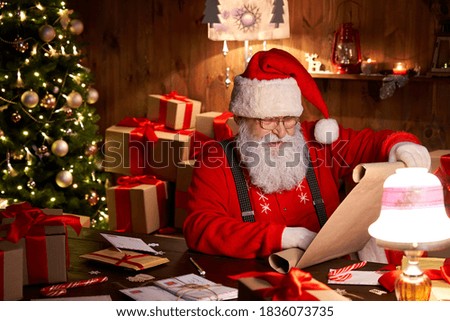 Similar – Image, Stock Photo Child Wearing Christmas Santa Claus Hat and beard on yellow background