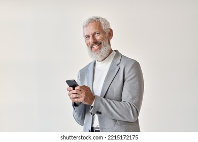 Happy Old Business Man Smiling Senior Mature Older Businessman Professional Wearing Suit Holding Cell Phone Using Smartphone Mobile App Online Standing Isolated On White Background Looking At Camera.