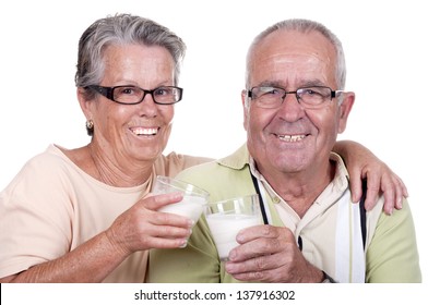 Happy Old Couple Drinking Milk, Over White Background