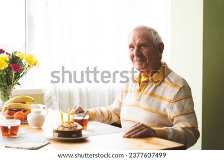 Happy old couple at home