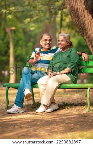 happy Old couple spending time together at park.