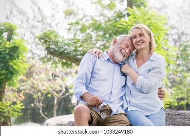 Happy old elderly caucasian couple smiling in park on sunny day, hoot senior couple relax in spring summer time. Healthcare lifestyle elderly retirement love couple together valentines day concept  - Powered by Shutterstock