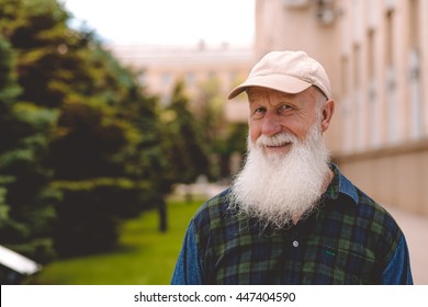 Happy Old Man With A Big White Beard And A Smile