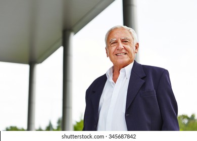 Happy Old Senior Business Man Smiling Outdoors