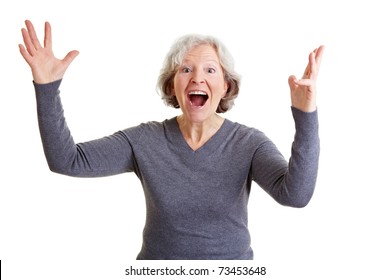 Happy Old Senior Woman Cheering With Her Hands In The Air