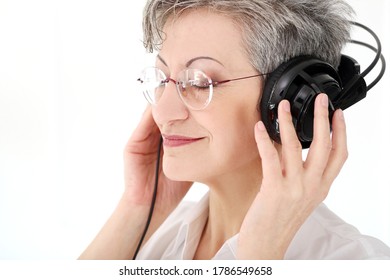 Happy Old Woman With Headphones