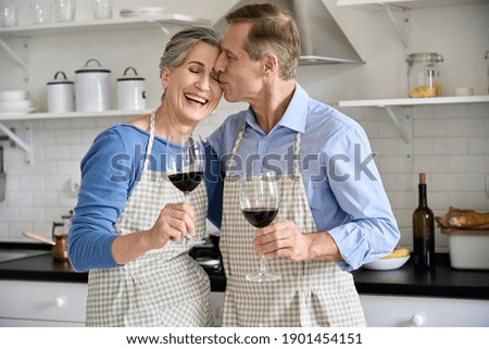 Similar – Image, Stock Photo Couple in love kissing on the terrace