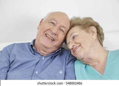 Happy Older Couple Still In Love And Playing And Being Silly